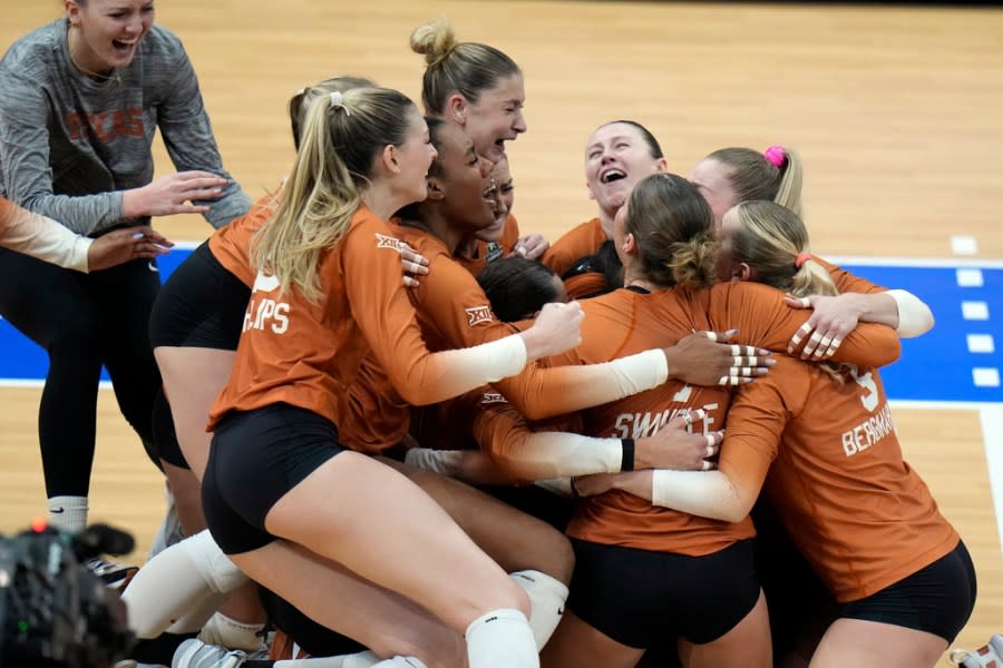 Texas players celebrate after winning the NCAA Division I women’s college volleyball tournament against Nebraska Sunday, Dec. 17, 2023, in Tampa, Fla. (AP Photo/Chris O’Meara)