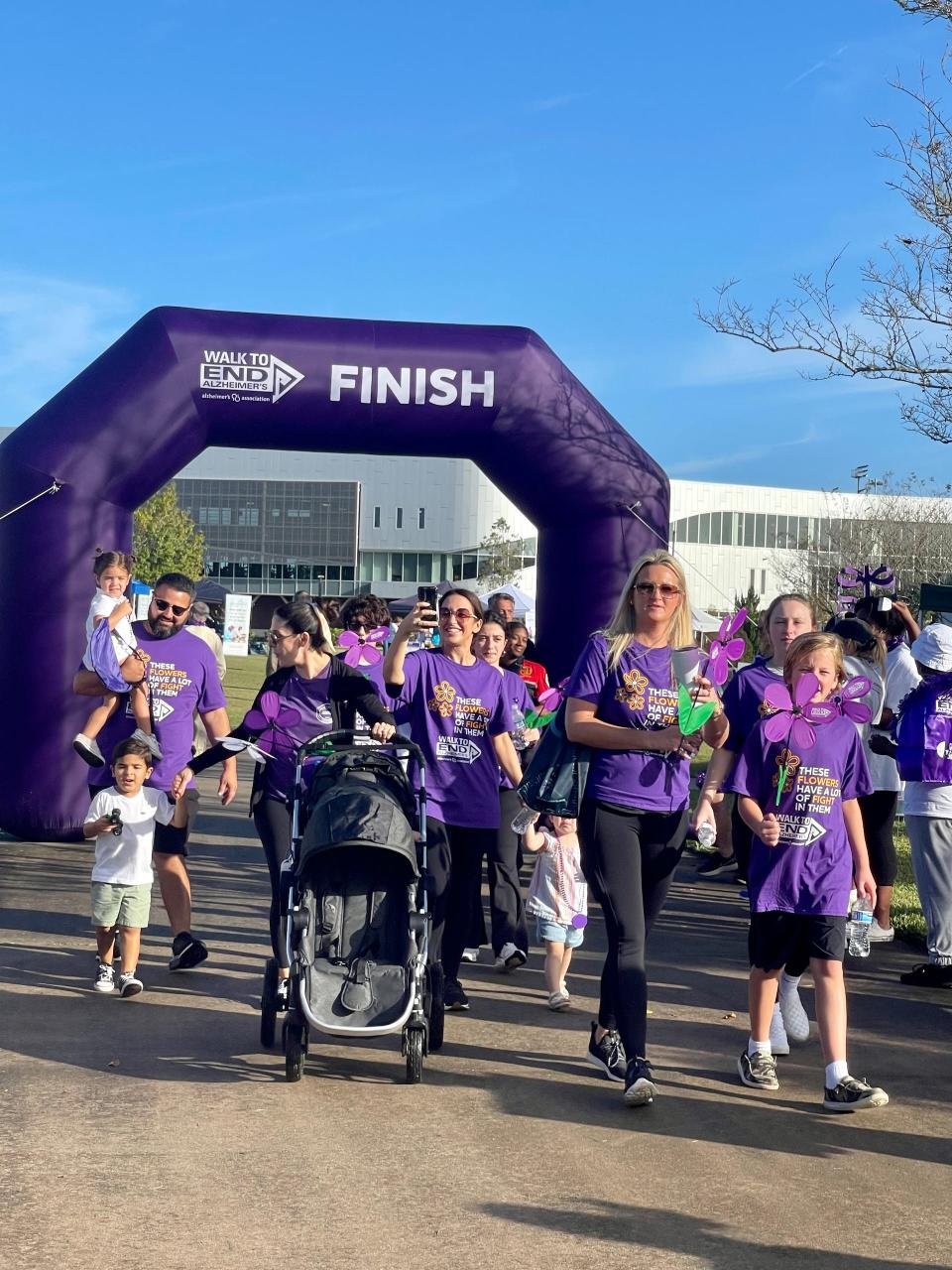 Participants begin the Walk to End Alzheimer’s at the University of North Florida outside the J. B. Coxwell Amphitheater in 2022 for the Alzheimer’s Association.