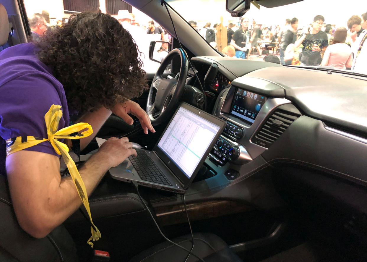 An attendee of the 2019 DEF CON cybersecurity event is seen at the conference's car hacking village in Las Vegas, Nevada, U.S., August 9, 2019. Picture taken August 9, 2019. REUTERS/Tina Bellon