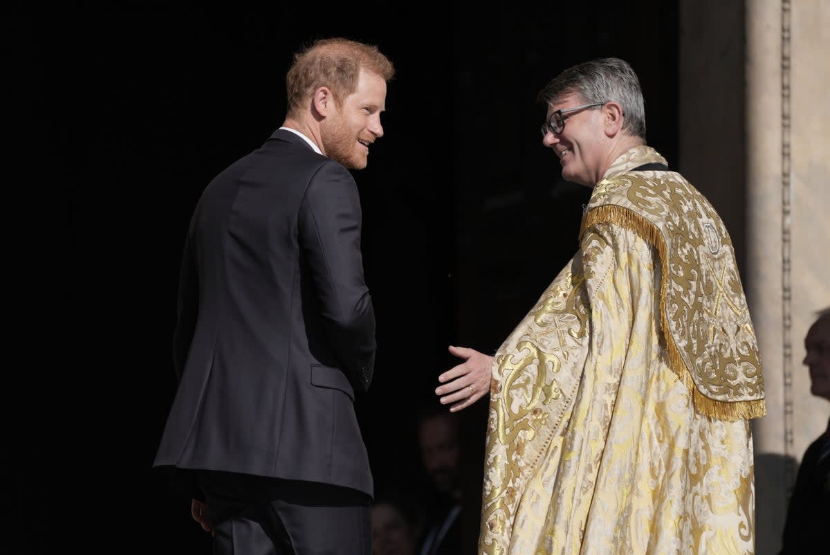 The Duke of Sussex was warmly greeted by the Dean of St Paul’s, the Very Reverend Andrew Tremlett, before being escorted to his seat under the cathedral’s great dome (Yui Mok/PA Wire)