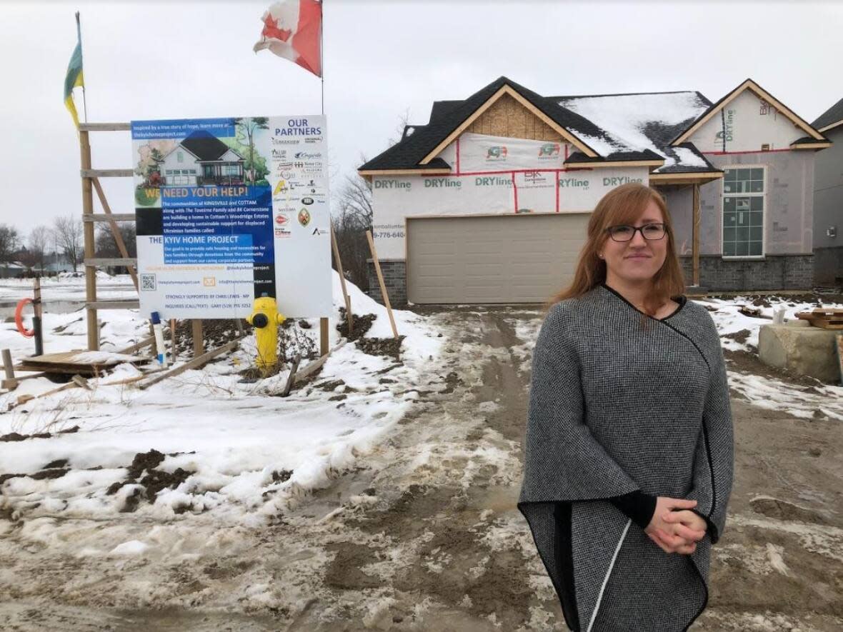 Jennifer Baggio is an ambassador of the Kyiv Home Project, a program which helps Ukrainian families re-settle in Cottam, Ont. Baggio said the house that will host two families will be ready to be occupied on March 1. (TJ Dhir/CBC - image credit)