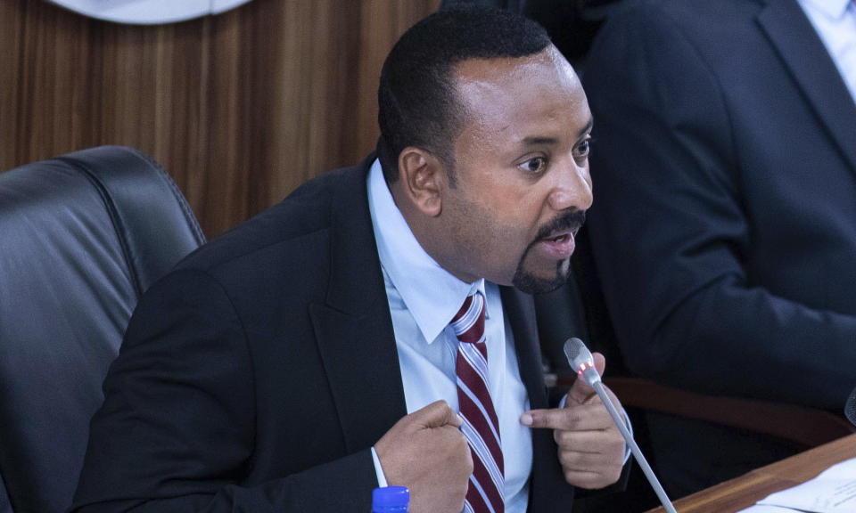 Ethiopian Prime Minister Abiy Ahmed addressing members of parliament on the current situation of the country inside the Parliament buildings, in Addis Ababa, Ethiopia, Tuesday Oct. 22, 2019. Ethiopia's Nobel Peace Prize-winning prime minister is warning that if there's a need to go to war over a dam project disputed with Egypt his country could ready millions of people, but he says only negotiation can resolve the deadlock. (AP photo Mulugeta Ayene)