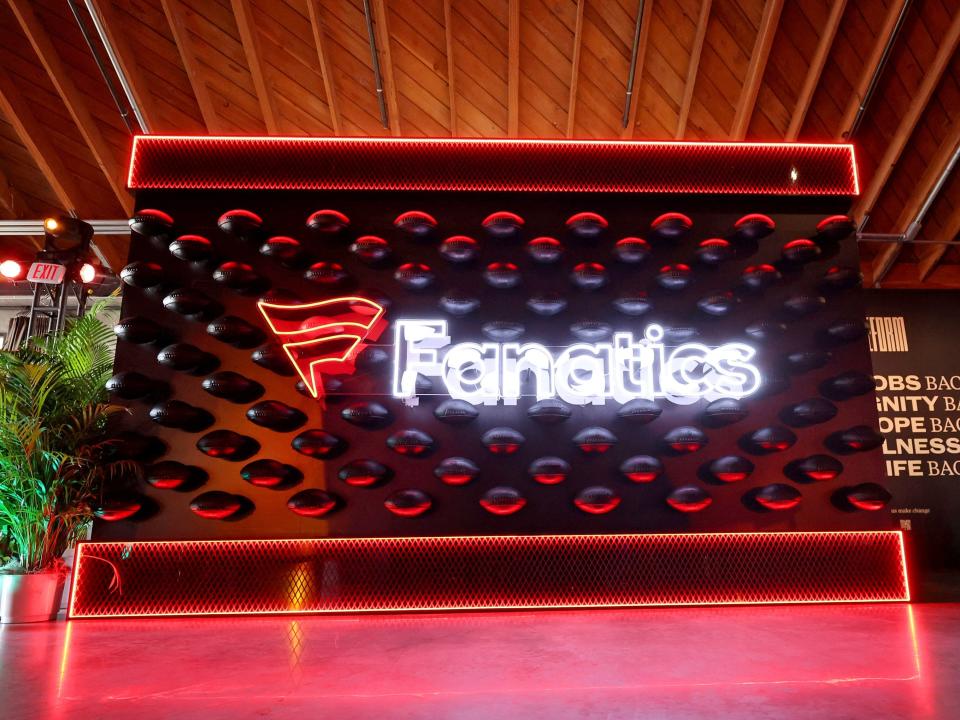 Fanatics' logo appears in neon at the company's 2022 Super Bowl party.