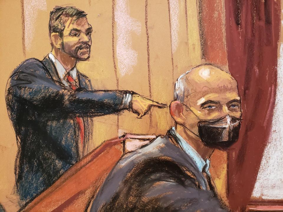 Assistant US  Attorney Andrew Rohrbach points to former attorney Michael Avenatti during his criminal trial (REUTERS)