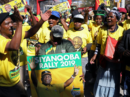 Supporters of President Cyril Ramaphosa's ruling party African National Congress (ANC) sing and dance at the party's final election rally ahead of the country's May 8 poll, in Johannesburg, South Africa, May 5, 2019. REUTERS/Siphiwe Sibeko