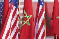 U.S and Moroccan flags stand together on the podium during a visit by David Schenker, US Assistant Secretary of State for Near Eastern Affairs, US Ambassador to Morocco David T. Fischer and Nasser Bourita, Moroccan Foreign Minister, in Dakhla, Morocco-administered Western Sahara, Sunday Jan. 10, 2021. The highest ranking U.S. diplomat for North Africa and the Middle East, as well as the first ever U.S Ambassador, traveled Sunday to the Morocco-administered Western Sahara city of Dakhla, laying the groundwork for the United States to set up a consulate in the disputed territory. (AP Photo/Noureddine Abakchou)