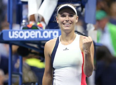 Sep 6, 2016; New York, NY, USA; Caroline Wozniacki of Denmark celebrates after recording match point against Anastasija Sevastova of Latvia on day nine of the 2016 U.S. Open tennis tournament at USTA Billie Jean King National Tennis Center. Mandatory Credit: Jerry Lai-USA TODAY Sports