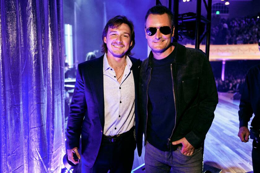 Morgan Wallen and Eric Church pose together backstage during 15th Annual Academy of Country Music Honors
