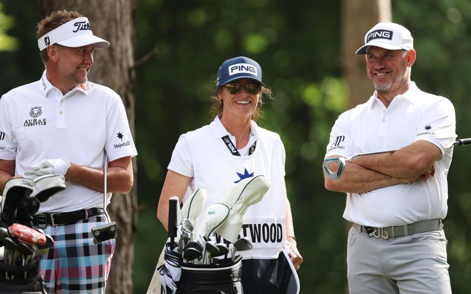 Lee Westwood of England pictured with his wife Helena and Ian Poulter of England at the LIV Invitational at The Centurion Club