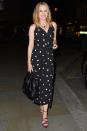 <p>Kylie Minogue is all smiles in a polka dot dress on Monday, while out with friends at The Ritz Hotel in London.</p>