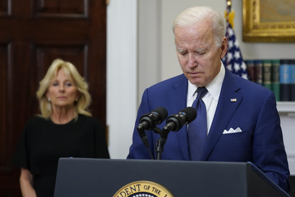 President Joe Biden pauses as he speaks about the mass shooting at Robb Elementary School in Uvalde, Texas, from the Roosevelt Room at the White House, in Washington, Tuesday, May 24, 2022, as first lady Jill Biden listens. (AP Photo/Manuel Balce Ceneta)