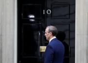 Members of Britain's cabinet meet at Downing Street in London