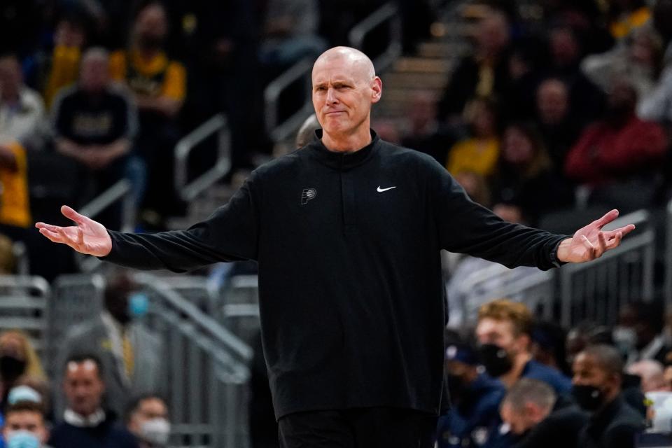 Indiana Pacers coach Rick Carlisle questions a call during the first half of an NBA basketball game against the Milwaukee Bucks in Indianapolis, Monday, Oct. 25, 2021.