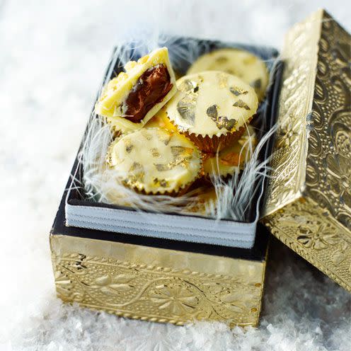 <p>A crisp exterior and luscious soft interior make these the ideal Christmas chocolate. They're so easy to make, and they keep well, too!</p><p><strong>Recipe: <a href="https://www.goodhousekeeping.com/uk/food/recipes/white-chocolate-and-hazelnut-cups" rel="nofollow noopener" target="_blank" data-ylk="slk:White chocolate and hazelnut cups;elm:context_link;itc:0;sec:content-canvas" class="link ">White chocolate and hazelnut cups</a></strong><br><br><br></p>
