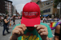 <p>A reveler shows off his hat mirroring President Trump’s campaign slogan Make America Great Again at the annual Pride Parade on June 24, 2018 in New York City. (Photo: Kena Betancur/Getty Images) </p>