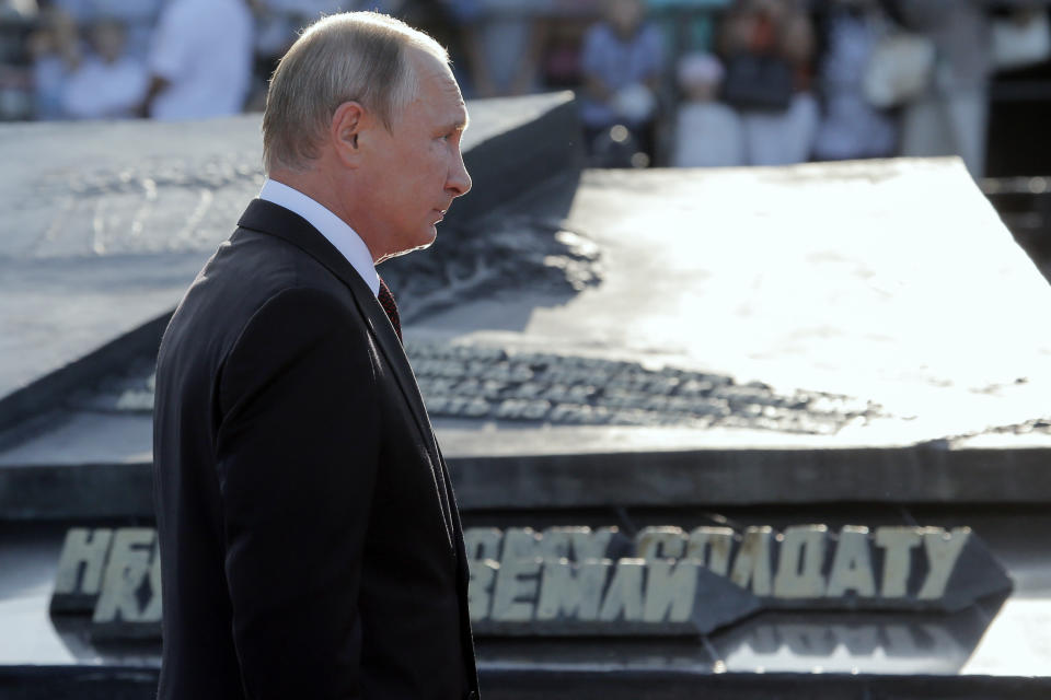 Russian President Vladimir Putin attends a laying ceremony in Kursk, 426 kilometers (266 miles) south of Moscow, Russia, Thursday, Aug. 23, 2018. Putin attended a ceremony marking the 75th anniversary of the battle of Kursk in which the Soviet army routed Nazi troops. It is described by historians as the largest tank battle in history involving thousands of tanks. (AP Photo/Alexander Zemlianichenko, Pool)