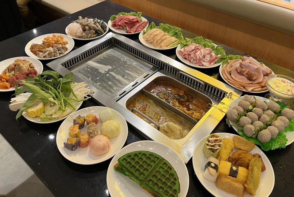 Pak John Steamboat BBQ - Ingredients surrounding grill and hot pot