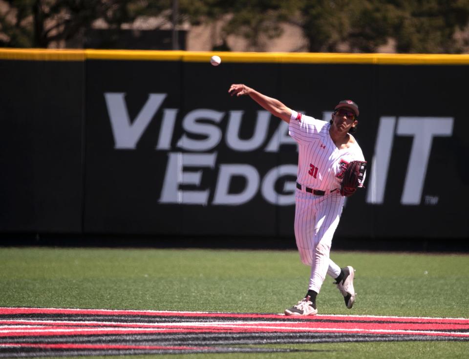 Texas Tech's utility Damian Bravo (31) throws the ball against Stephen F. Austin in a non-conference baseball game, Tuesday, March 26, 2024, at Rip Griffin Park.