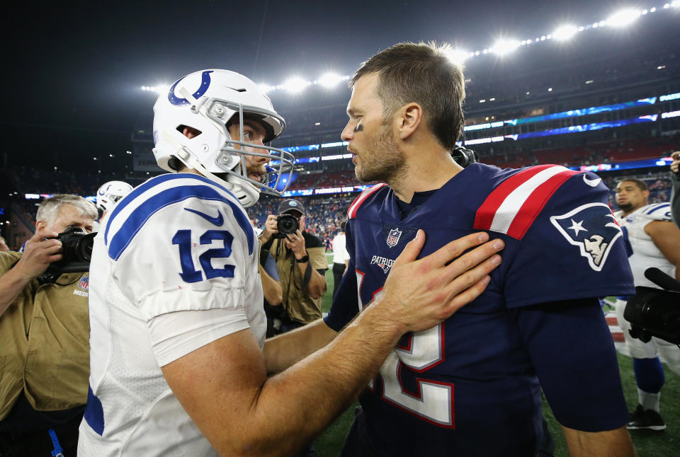 Tom Brady, right, said Andrew Luck has the right to make the best decision for himself. (Getty Images)