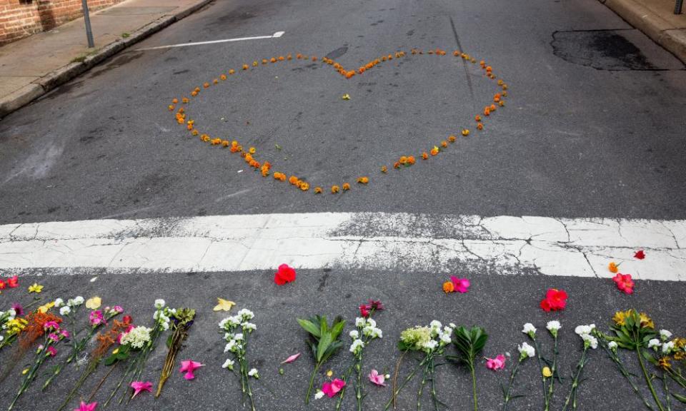 A heart shaped group of flowers placed at the corner of Fourth Street and Water Street, where Heather Heyer was murdered by white supremacist James Fields at the Unite the Right rally in Charlottesville, Virginia, on 12 August 2017.