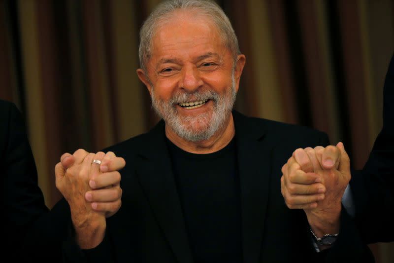 Brazil's former President Luiz Inacio Lula da Silva reacts during a meeting with members of the Workers Party (PT) in Brasilia