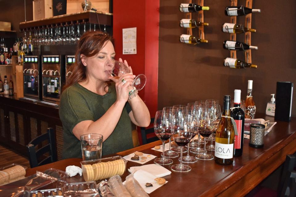 Beth DeVries, owner of Della Viti wine bar on Ames' Main Street, has been honored by the Iowa Restaurant Association with the Restaurant Neighbor Philanthropy Award.