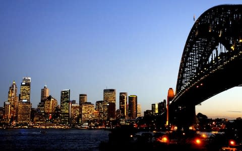 Sydney's financial district at night - Credit: Jeremy Piper/Bloomberg News