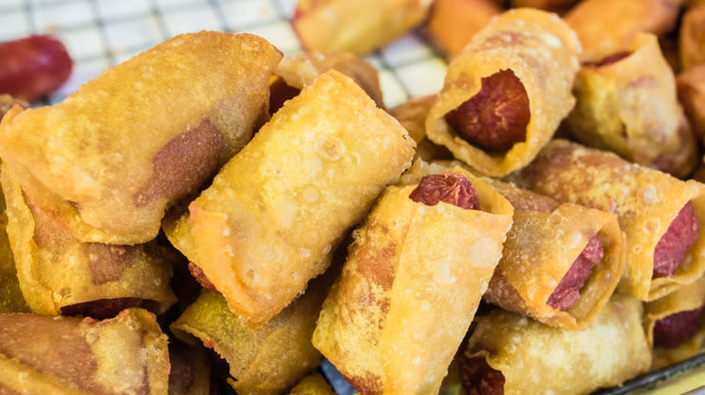 Fried cocktail sausages with wonton wrappers