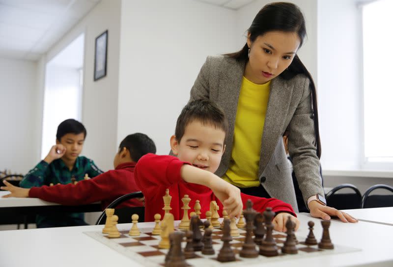 Kazakh chess player and social activist Dinara Saduakassova teaches children in the Chess Academy in Nur-Sultan