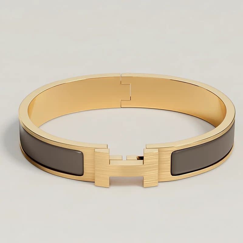 <p><a href="https://www.hermes.com/us/en/product/clic-hh-bracelet-H703203FM5CT5/" rel="nofollow noopener" target="_blank" data-ylk="slk:Shop Now;elm:context_link;itc:0;sec:content-canvas" class="link rapid-noclick-resp">Shop Now</a></p><p>Clic HH Bracelet</p><p>hermes.com</p><p>$670.00</p>