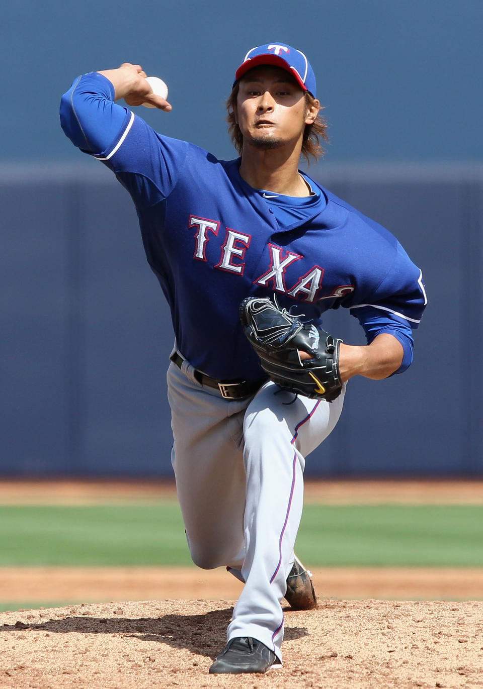 PEORIA, AZ - MARCH 07: Starting pitcher Yu Darvish #11 of the Texas Rangers pitches against the San Diego Padres during the spring training game at Peoria Stadium on March 7, 2012 in Peoria, Arizona. (Photo by Christian Petersen/Getty Images)
