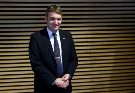 Andre Poggenburg of the anti-immigration Alternative for Germany (AfD) party arrives at the state parliament in Magdeburg, Germany March 13, 2016. REUTERS/Wolfgang Rattay