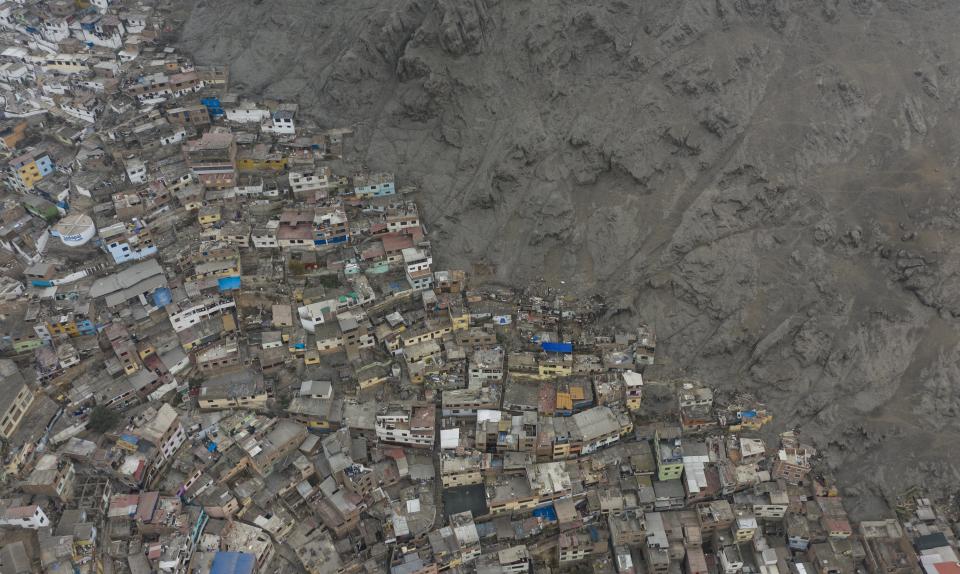 The Rimac neighborhood is seen from above amid the new coronavirus pandemic, in Lima, Peru, Wednesday, June 24, 2020. (AP Photo/Rodrigo Abd)
