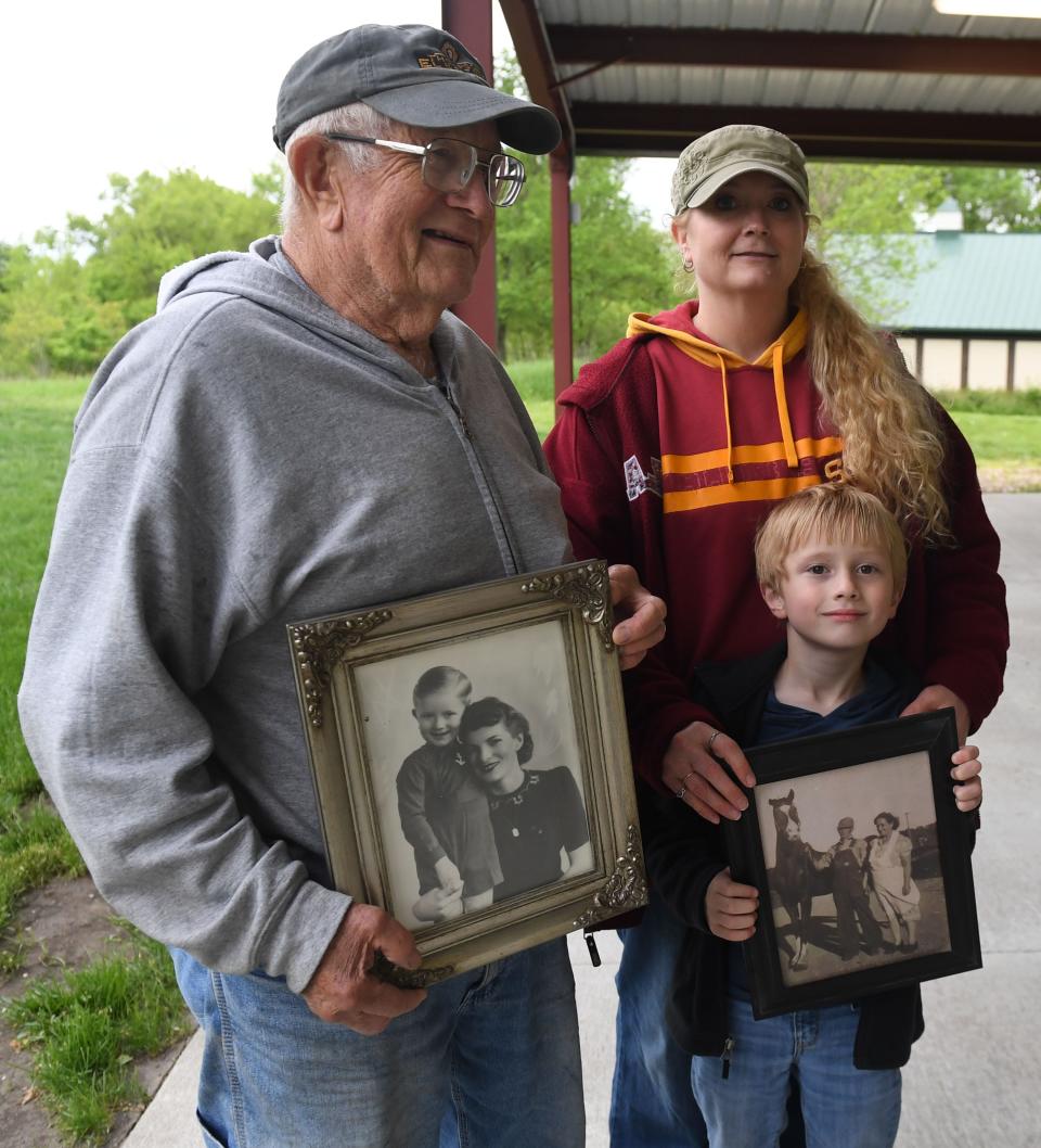 Washington Township shows their five-generation photos of the residents of this area during a meeting against the City of Ames' Urban Fringe Plan and land rights at Raspberry Hill on 240th St. on Thursday, May 26, 2022, in Ames, Iowa.