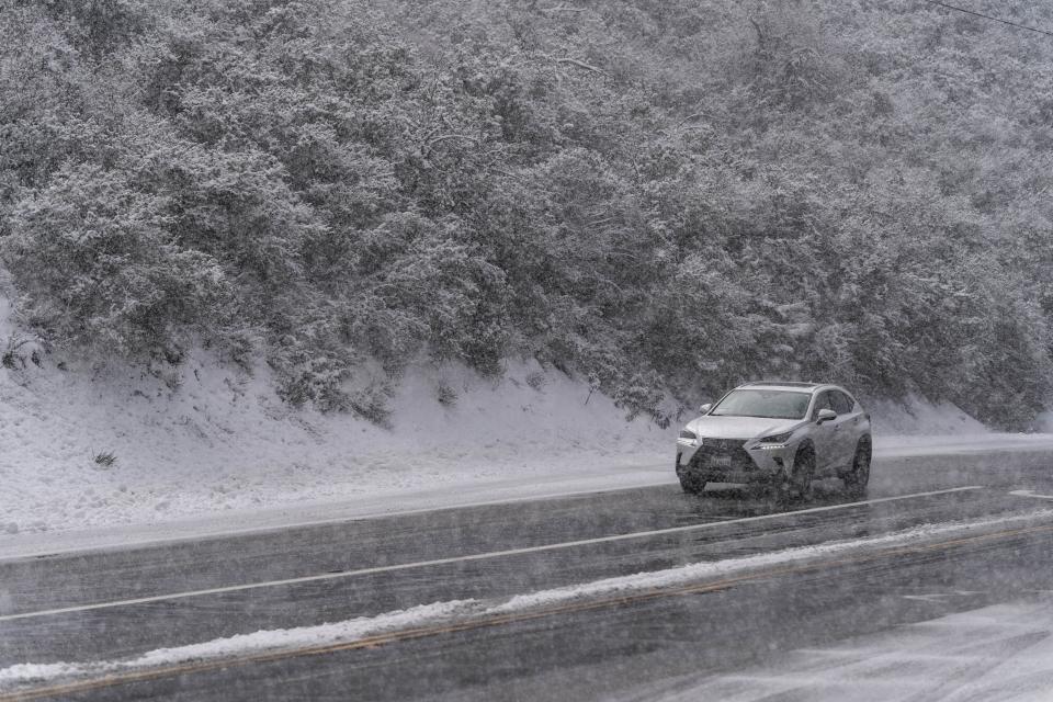 A driver on the road in Angeles National Forest (Copyright 2023 The Associated Press. All rights reserved)