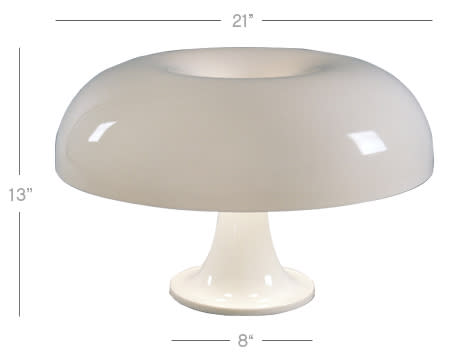 The table lamp is the Artemide Nesso Lamp ($380) designed by Giancarlo Mattioli in 1967.