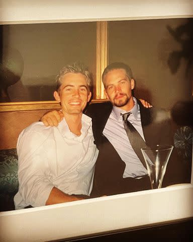 <p>Caleb Walker Instagram</p> Paul Walker hugs his brother Caleb Walker for a photo