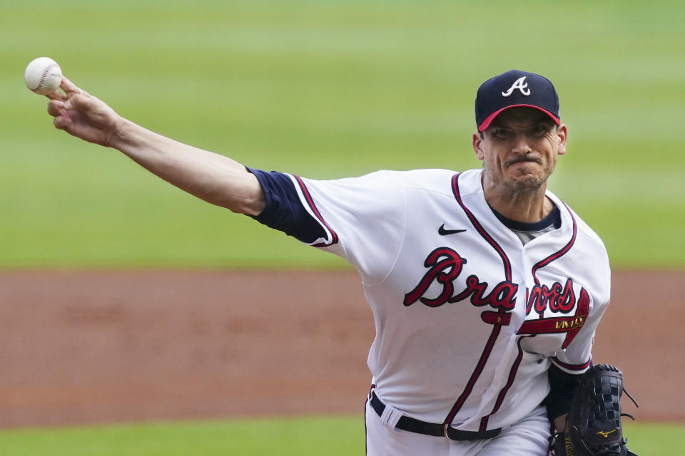 Atlanta Braves starting pitcher Charlie Morton (50) delivers against the Milwaukee Brewers during the first inning of Game 4 of a baseball National League Division Series, Tuesday, Oct. 12, 2021, in Atlanta. (AP Photo/John Bazemore)