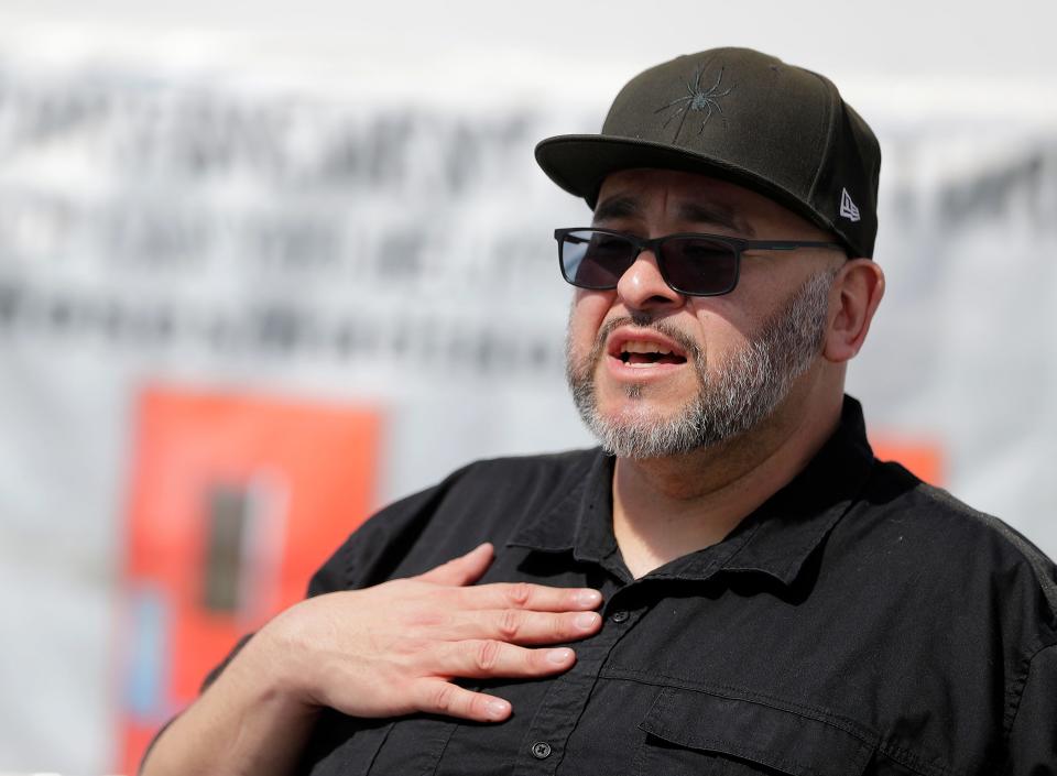 Bobby Ayala, who spent a significant amount of time in solitary confinement at multiple correctional institutions, talks during a solitary confinement cell replica tour event on Thursday at St. Joseph Catholic Church in Appleton.