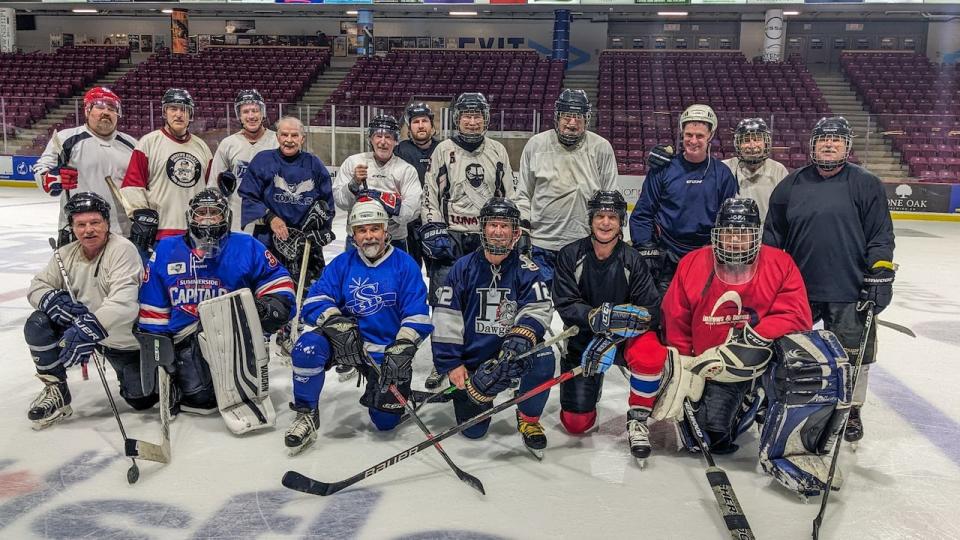 The rec league players pose on the ice after Thursday's noon-hour game at Credit Union Place in Summerside. 