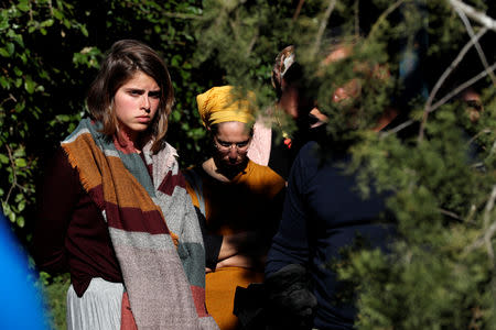 Relatives and friends mourn during the funeral of Israeli rabbi Achiad Ettinger, in the Jewish settlement of Eli in the Israeli-occupied West Bank March 18, 2019. REUTERS/Ronen Zvulun