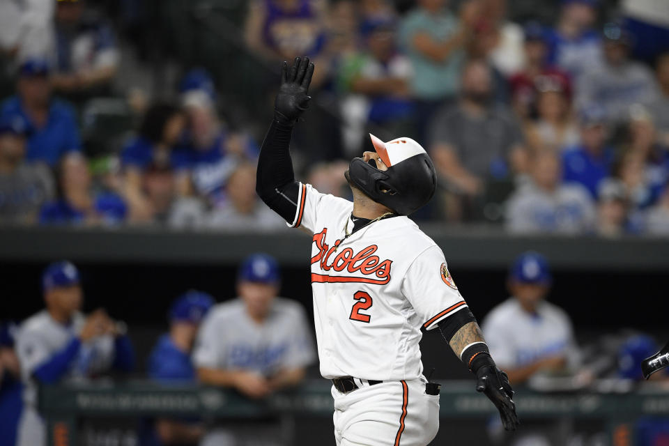 Baltimore Orioles' Jonathan Villar celebrates his three-run home run during the seventh inning of the team's baseball game against the Los Angeles Dodgers, Wednesday, Sept. 11, 2019, in Baltimore. Villar connected for the 6,106th homer in the majors this season. That topped the mark of 6,105 set in 2017. The Orioles won 7-3. (AP Photo/Nick Wass)