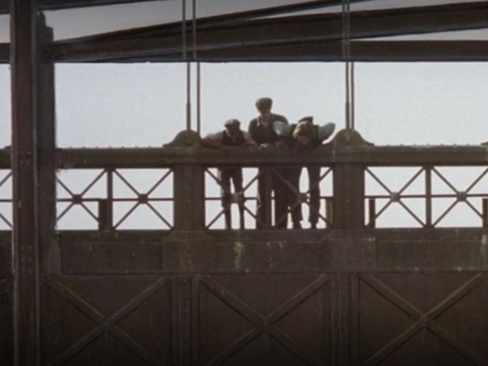 Newsies brooklyn bridge scene a group of boys on a bridge