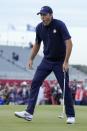 Team USA's Scottie Scheffler reacts to making his putt and winning the 15th hole during a four-ball match the Ryder Cup at the Whistling Straits Golf Course Saturday, Sept. 25, 2021, in Sheboygan, Wis. (AP Photo/Ashley Landis)