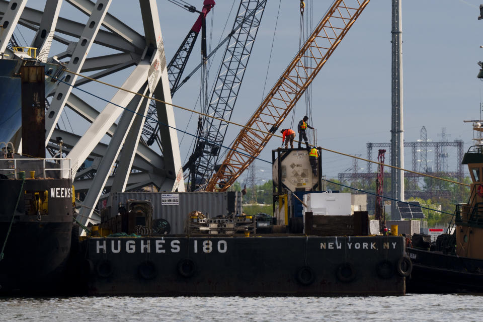 Salvage work continues on the collapsed Francis Scott Key Bridge, Thursday, April 25, 2024, in Baltimore. (AP Photo/Matt Rourke)