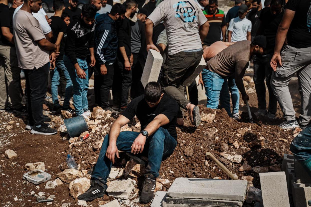 Family and members of the community attend the funeral for Mohammad Abu Aabed, who was killed by an Israeli airstrike.