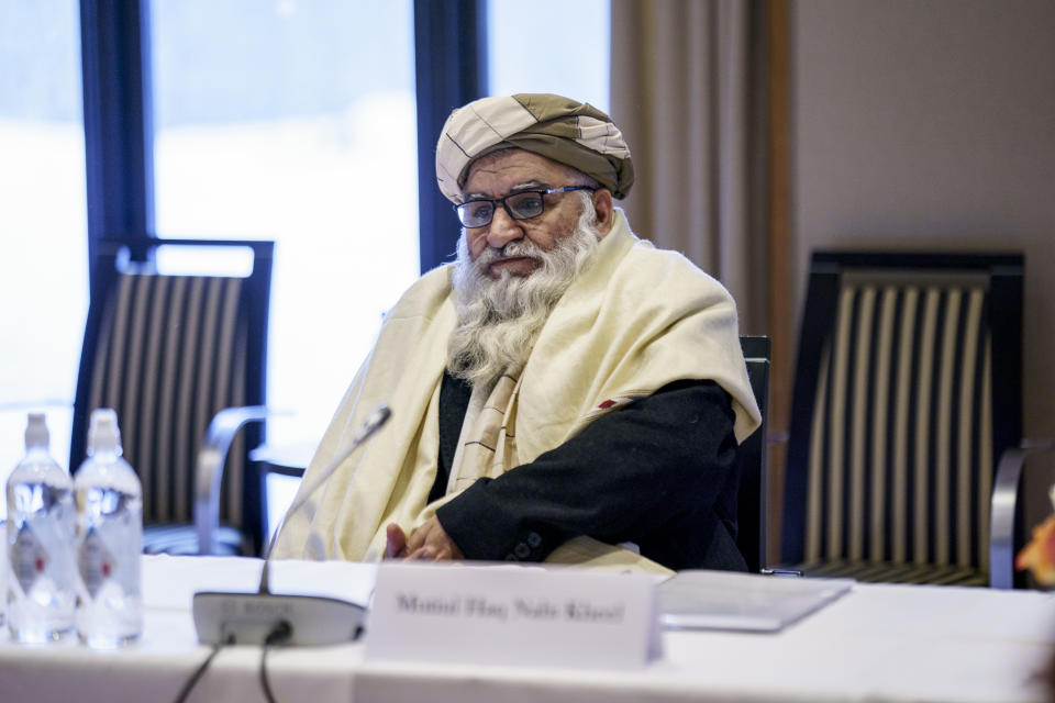 Taliban representative Mutiul Haq Nabi Kheel is seated, ahead of a meeting, in Oslo, Norway, Monday, Jan. 24, 2022. Western diplomats are meeting with Afghan women’s rights activists and human rights defenders in Oslo ahead of the first official talks with the Taliban in Europe since the Taliban took over in August. The closed-door meeting was a chance to hear from civil society in Afghanistan and the Afghan diaspora their demands and assessment of the current situation on the ground. The meeting was taking place at a hotel in the snow-capped mountains above the Norwegian capital and was attended by representatives of the EU, the US, the United States, France, Italy and hosts Norway. (Stian Lysberg Solum/NTB via AP)