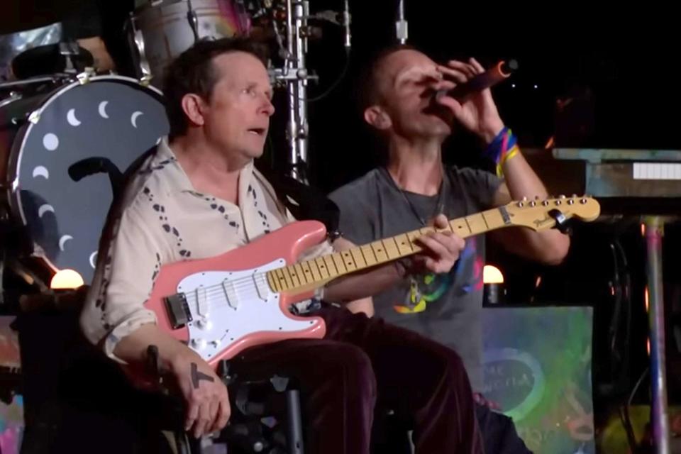 <p>BBC Music/YouTube</p> Michael J. Fox performs with Chris Martin and Coldplay
