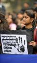 An Indian demonstrator holds a placard during a protest calling for better safety for women following the rape of a student in the Indian capital, in New Delhi on December 27, 2012. An Indian gang-rape victim died Saturday in Singapore after suffering severe organ failure, the hospital treating her said, in a case that sparked widespread street protests over violence against women