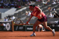 Tunisia's Ons Jabeur plays a shot against Brazil's Beatriz Haddad Maia during their quarterfinal match of the French Open tennis tournament at the Roland Garros stadium in Paris, Wednesday, June 7, 2023. (AP Photo/Thibault Camus)